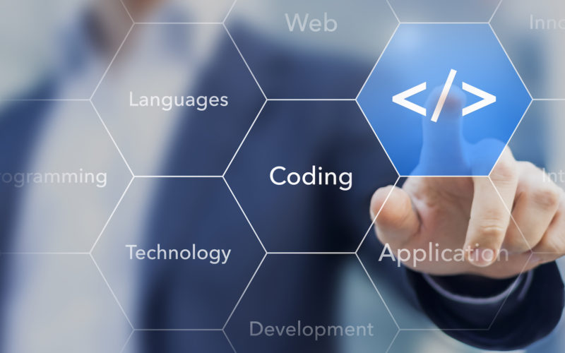 Coding symbol on virtual screen about developing apps or websites